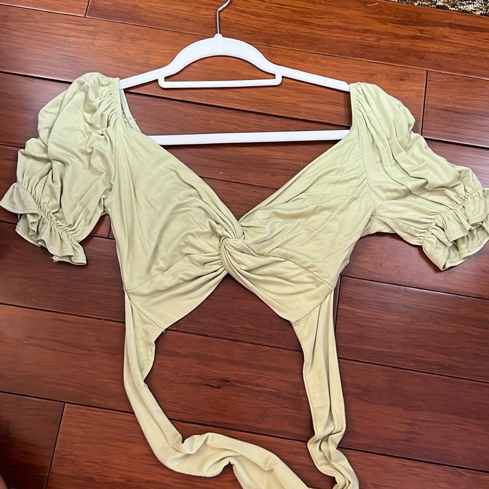 Isabelle’s Cabinet sage green wrap top
